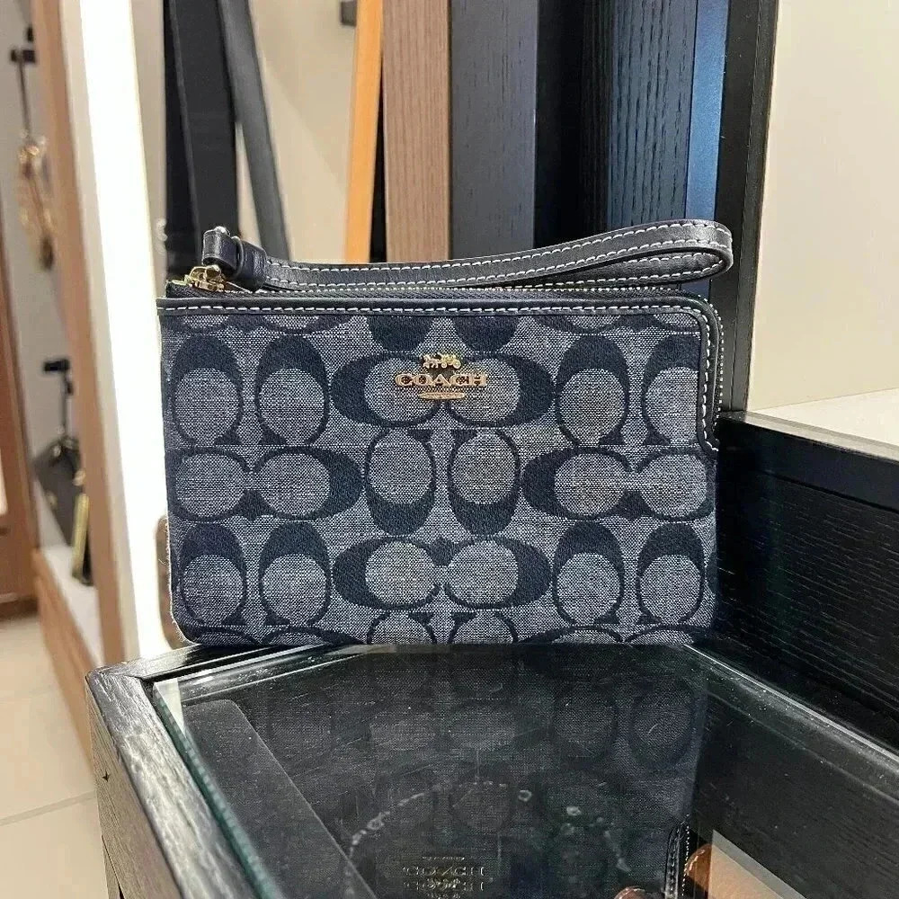 Coach Outlet Corner Zip Wristlet In Signature Chambray